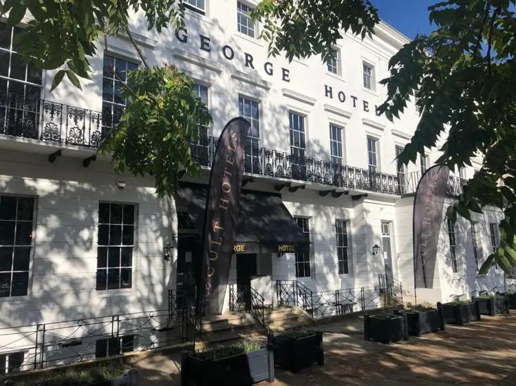 A bedroom at The George hotel on St George's Road, Cheltenham